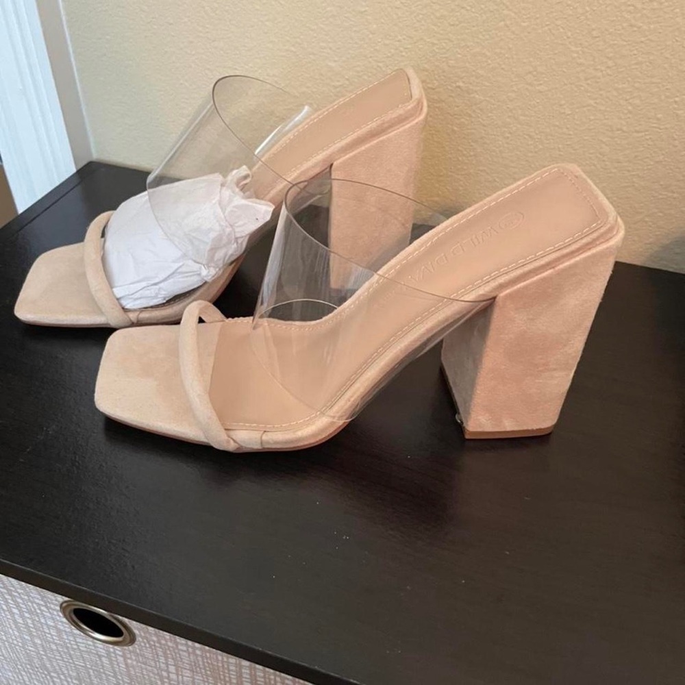 Miss Lola clear platform heel. Never worn.